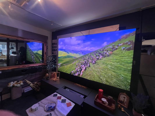 Integrated Cinema Solution including immersive wireless surround sound speakers