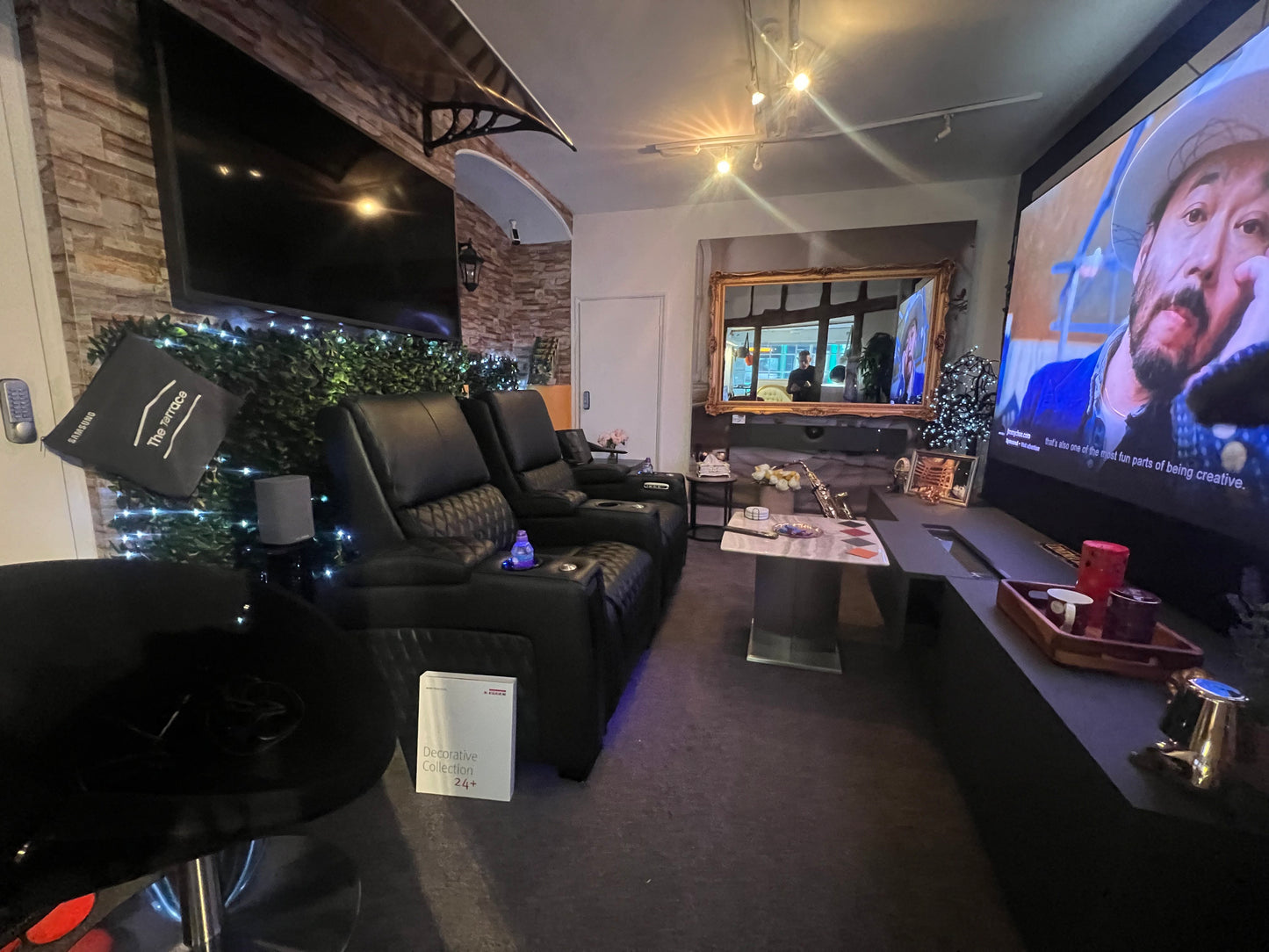 Integrated Cinema Solution including immersive wireless surround sound speakers